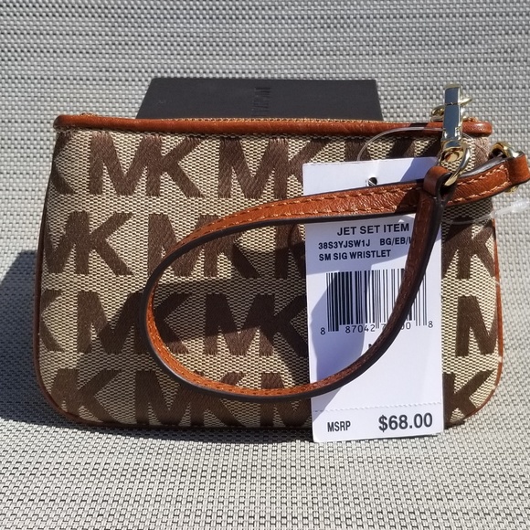 Michael Kors Handbags - Michael Kors Jet Set Small Signature Wristlet